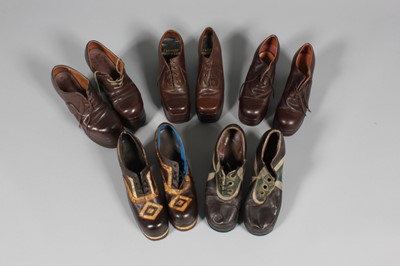 Lot 168 - Five pairs of men's platform shoes, early...