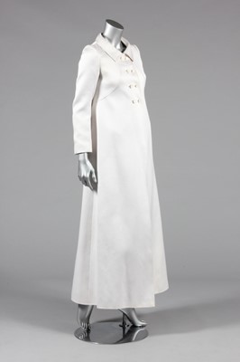 Lot 179 - A Courreges white satin jersey evening coat,...