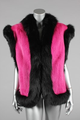 Lot 199 - A fine Revillon shocking pink mink and black...