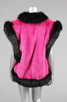 Lot 199 - A fine Revillon shocking pink mink and black...