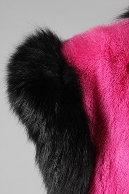 Lot 199 - A fine Revillon shocking pink mink and black...
