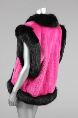 Lot 199 - A fine Revillon shocking pink mink and black...