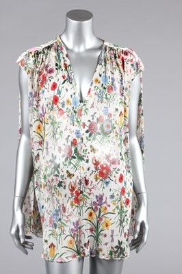 Lot 200 - A Gucci floral printed tulle tunic and...