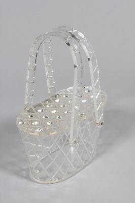 Lot 211 - A Lucite handbag, American, 1950s, together...