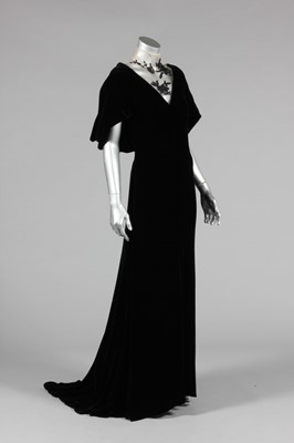 Lot 225 - An Alexander McQueen velvet and lace evening...