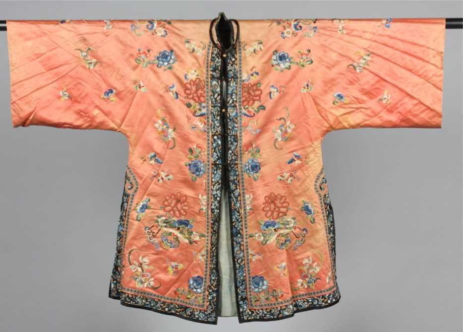 Lot 218 - A ladies peach satin informal robe, Chinese,
