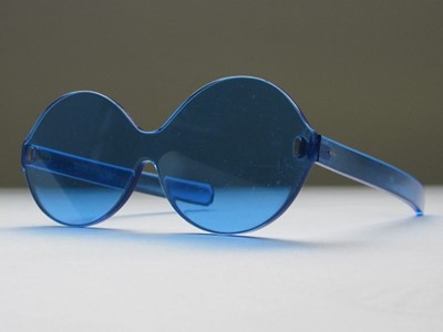 Lot 239 - A pair of Elysees Optical blue glasses, 1960s,...