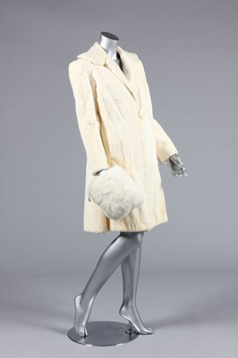 Lot 249 - An ivory fur coat, late 1920s, incised with...