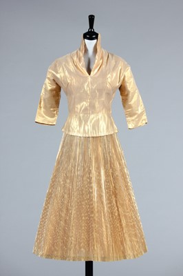 Lot 256 - An Anita Bari of New York cloth of gold...