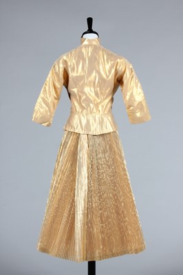 Lot 256 - An Anita Bari of New York cloth of gold...