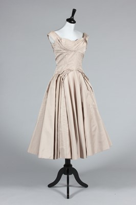 Lot 261 - A Ceil Chapman pale beige taffeta ball gown,...