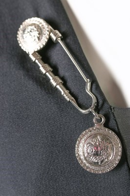 Lot 227 - A Gianni Versace 'Safety Pin' dress,...
