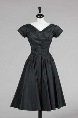 Lot 266 - A Ceil Chapman black taffeta cocktail dress,...