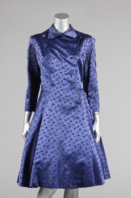 Lot 267 - A Ceil Chapman blue figured satin dress coat,...