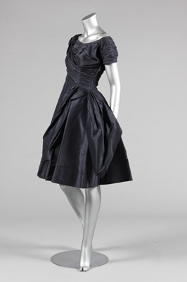 Lot 270 - A Ceil Chapman midnight blue taffeta cocktail...