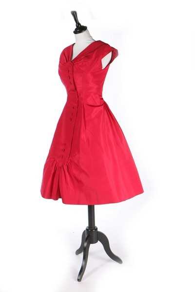 Lot 74 - A Carven couture raspberry-pink faille...
