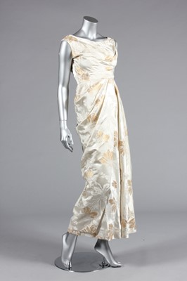 Lot 297 - A Ceil Chapman ivory brocaded satin...