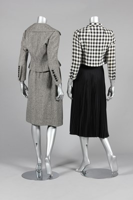 Lot 330 - A Norman Norell flecked grey tweed day-suit,...