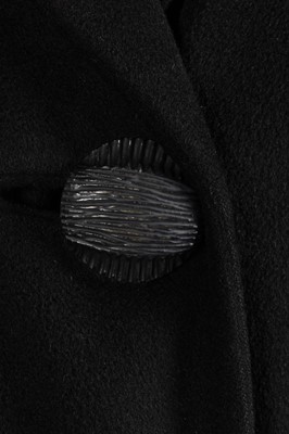 Lot 330 - A Norman Norell flecked grey tweed day-suit,...