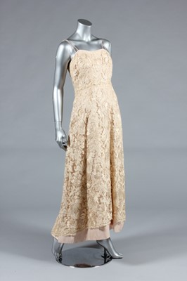 Lot 337 - An Ernest Newman champagne silk and lace...