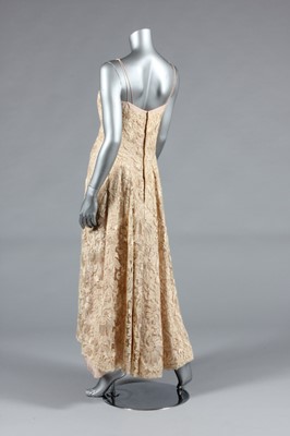 Lot 337 - An Ernest Newman champagne silk and lace...