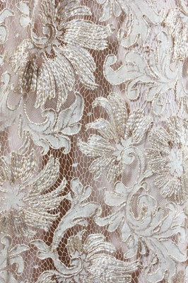 Lot 337 - An Ernest Newman champagne silk and lace...
