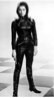 Lot 349 - A brown wet-look nylon Emma Peel/Cardin style...