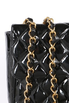 Lot 16 - A Chanel patent leather jumbo flap bag,...