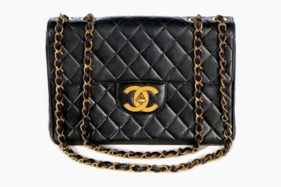 Lot 11 - A Chanel quilted leather jumbo flap bag, late...
