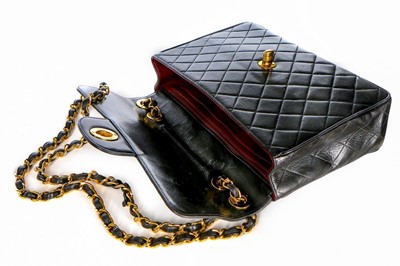 Lot 17 - A Chanel quilted leather jumbo flap bag, late...