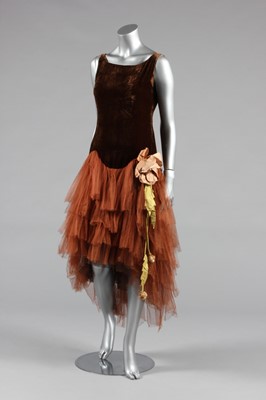 Lot 427 - A brown velvet and tulle cocktail dress, circa...