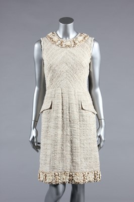 Lot 448 - Three designer day dresses, comprising: Oscar...