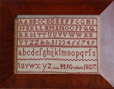 Lot 552 - A miniature sampler by M.J. Graham, 1827,...