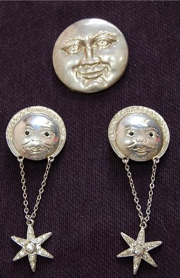 Lot 463 - A Bulter and Wilson sterling silver smiling...