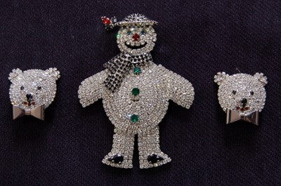 Lot 467 - A Butler and Wilson snowman brooch, late 1980s,...