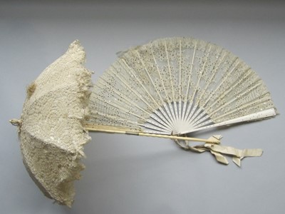 Lot 241 - A carriage parasol, circa 1860, with tatting...