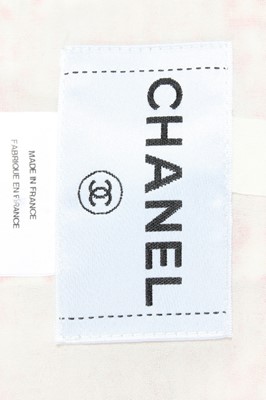 Lot 440 - A Chanel red and white tweed suit, labelled...