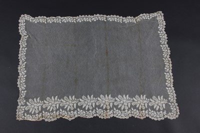 Lot 495 - A Brussels needlepoint appliqué bonnet veil,...