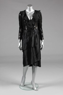 Lot 31 - A Nina Ricci black sequin and satin cocktail...