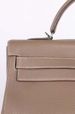 Lot 58 - An Hermès étoupe Clemence leather Kelly 40,...