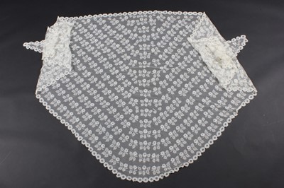 Lot 483 - A Carrickmacross lace bridal veil, late 19th...