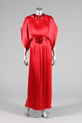 Lot 73 - A Yuki red pleated evening gown, probably...