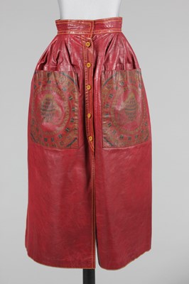 Lot 25 - A Bill Gibb red leather skirt, circa 1975,...