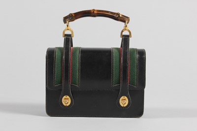 Lot 41 - A Gucci leather handbag with bamboo handle,...