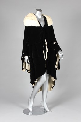 Lot 44 - An R. Altmann & Co black velvet opera coat,...