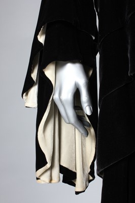 Lot 44 - An R. Altmann & Co black velvet opera coat,...