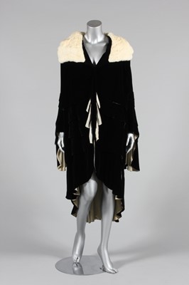 Lot 44 - An R. Altmann & Co black velvet opera coat,...