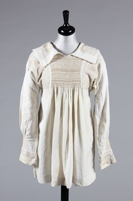 Lot 49 - An embroidered farmer's smock, circa 1900,...