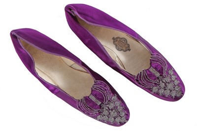 Lot 99 - A fine pair of mauveine dyed satin shoes,...