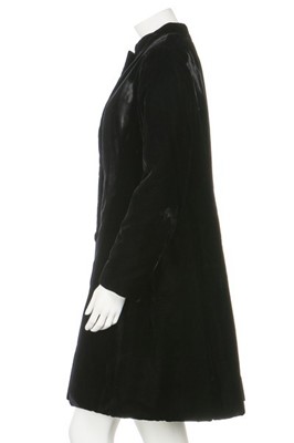 Lot 124 - A Christian Dior black velvet coat, late 1950s-...